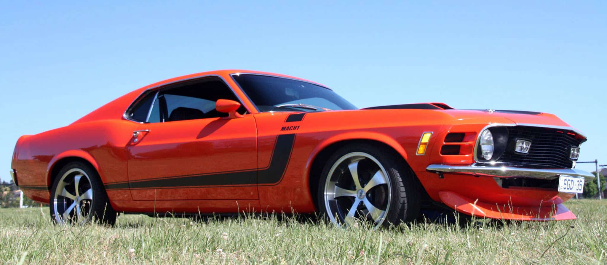 orange ford mach1 mustang limo hire